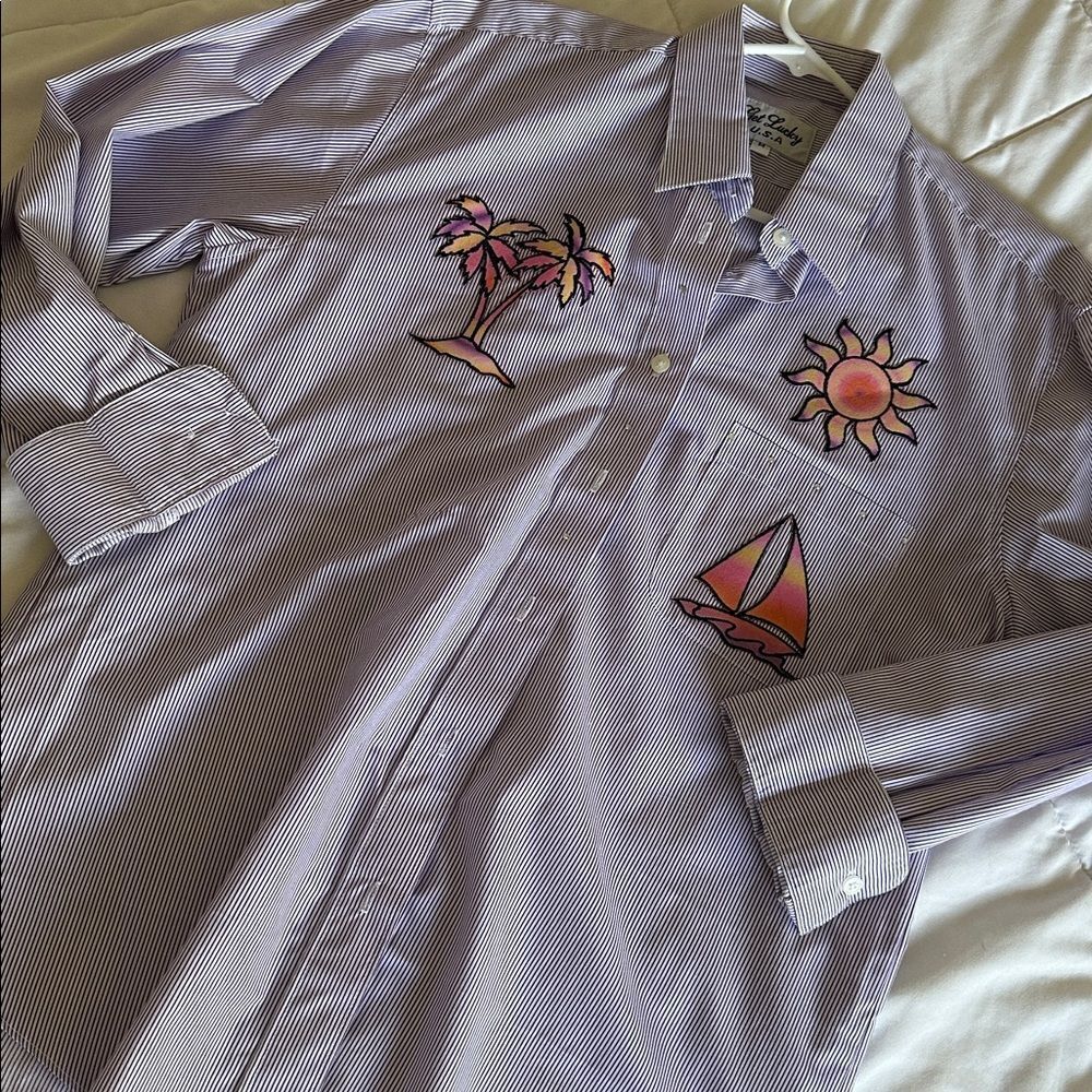 Stylish Purple Button-Down Shirt with Graphic Designs
